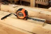 NEO TOOLS Mérőszalag, 5m/25mm, erősített rugós, acél, fekete szalag fehér nagyított skálával, mágneses, autostop+rögzítő 67-243