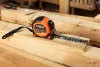 NEO TOOLS Mérőszalag, 10m/25mm, erősített rugós, acél, fekete szalag fehér nagyított skálával, mágneses, autostop+rögzítő 67-245